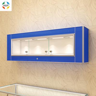 China Fashion Factory New Design Glass Wall Display, Fashion LED Lighting Jewelry Watch Glasses Display Cabinet For Shopping Mall for sale