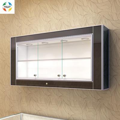 China New Fit Furniture Aluminum+Tempered Glass+UV Base Plate China Hot Selling Fully Collected Decorative Jewelry Shopping Mall Wall Hanging Curiosity Display Cabinet for sale