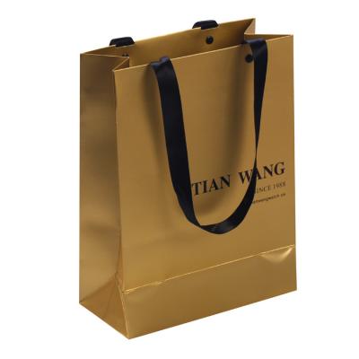 China Recycled Materials Hot Selling High Quality Golden Kraft Paper Custom Print With Handles Paper Bag For Gift for sale