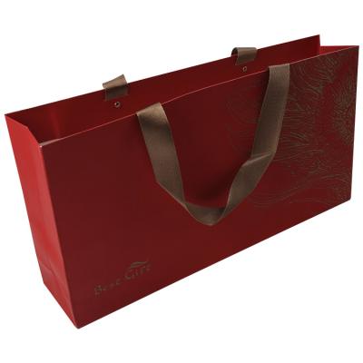 China Recycled Materials High Quality Sturdy Useful Red Custom Kraft Paper Print With Handles Paper Bag for sale