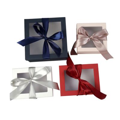 China Recycled Materials Folding Magnetic With Ribbon Baby Custom Luxury Paper Packaging Box For Gift for sale