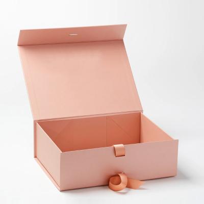 China Handmade Wholesale Customized Magnetic Paper Packaging Boxes Folding Paper Box With Ribbon Bow for sale