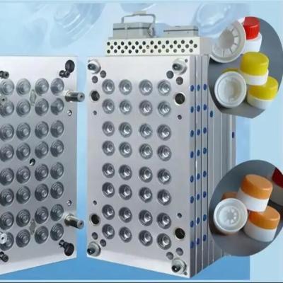 China OEM Plastic Liquor Bottle Cap Mould Polishing Surface 300000-500000 Shots for sale