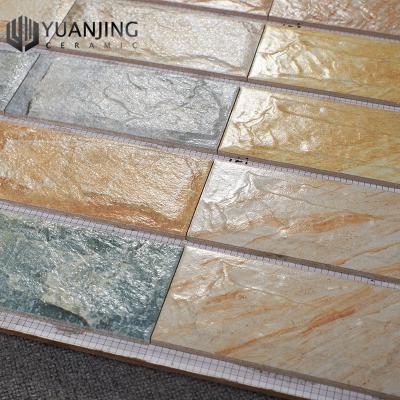 China Hot Selling Rustic Tiles 100x200mm Outdoor Antique Artificial Stone 3D Concave Concave Texture Porcelain Villa Wall Ceramic Villa Wall Tiles for sale