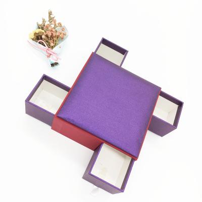 China Multifunctional Recycled Materials Magnet Special Shaped Folding Boxes With Ribbons For Perfume Bottle for sale