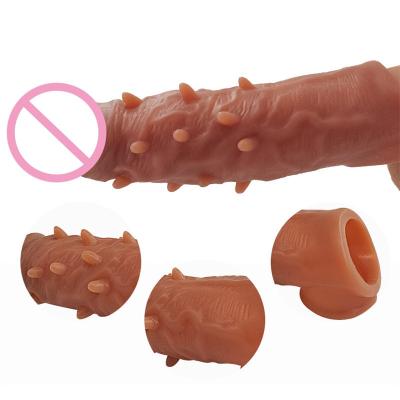 China 100% Waterproof Wholesale Men's Plastic Penis Condom Sex Toys Lengthened And Penis Condom Bold Pointed Dildo Reusable Penis Sleeves Male Sheath for sale