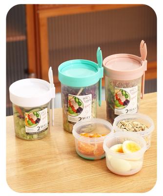 China Freshness Preservation Airtight Plastic Food Storage Container Fruit Cereal Cup Oats Jar Salad Cup with Fork for sale