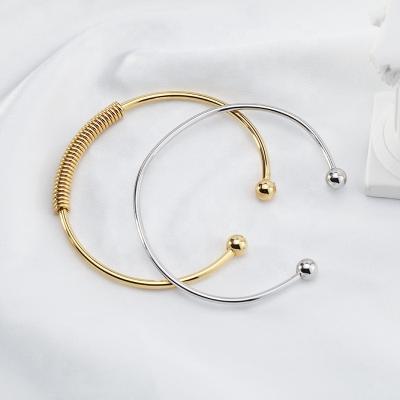 China Fashion CLASSIC Single Spring Pattern Stainless Steel Open C Shape Woman Adjustable Gold Plated Charm Bracelet for sale