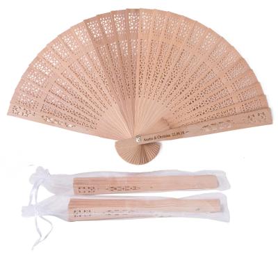 China Can Use As Gift Give Personalized Engraved Sandalwood Fan With Organza Bags Wedding Favors Gifts For Guest Party Decoration Han Wooden Fans for sale