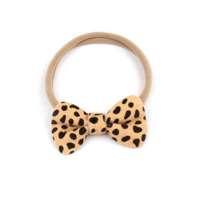 China Fashion Custom Cartoon Cloth Baby Bow Knot Genuine Leather Headband for sale