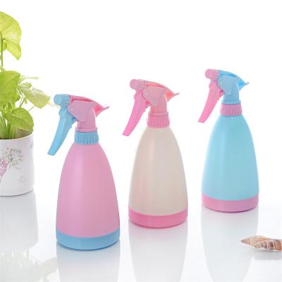 China Garden Makers Custom Household 500ml Small Flower Candy Colored Watering Can Squeeze Type Watering Sprayer Bottle for sale