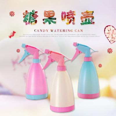 China Garden Makers Custom Household 500ml Small Flower Candy Colored Watering Can Squeeze Type Watering Sprayer Bottle for sale