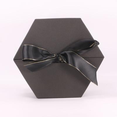 China Recycled Materials Black Flower Hexagon Gift Boxes for sale