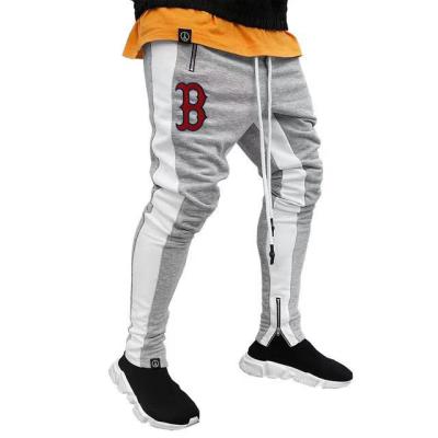 China Anti-Wrinkle Mens Joggers Pants Zipper Pockets Casual Mens Trousers Cotton Jogging Sweatpants for sale