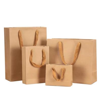 China Handmade Outdoor Shopping Portable Foldable Gift Kraft Eco - Friendly Recyclable Paper Bags With Handles for sale