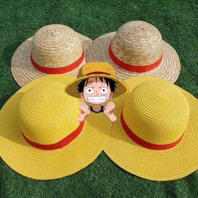 China 2022 new image collection pure color round hats natural luffy children ladies beach luffy hats men summer one-piece straw hat with ribbon for sale