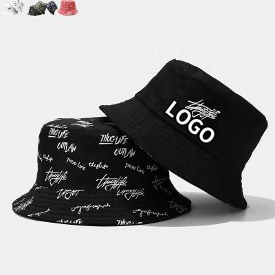 China 2022 fashion custom logo cotton UF 50 white and black double side embroidered flower bucket hat cap wholesale with pattern for sale