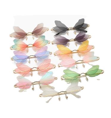 China Hot Selling Fashion Sunglasses Personalized Ladies Butterfly Rimless Sun Glasses Butterfly Wings Funny Party Glasses for sale