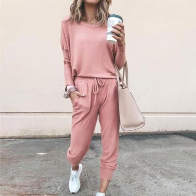 China 2022 Polyester Women's Trouser Suits 100% Knitted Casual Solid Color O-Neck Loose Pants Suit 2 Piece Sets for sale