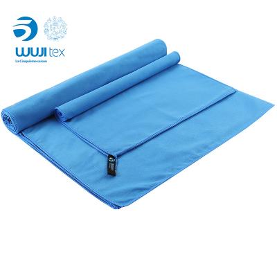 China Compressed Quick Dry Water Absorbent Beach Travel Microfiber Toalha Suede Towel for sale