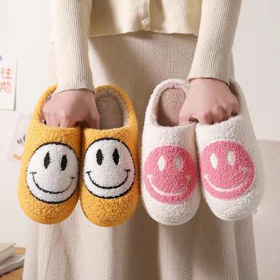 China Hot Sale Bedroom Smiley Face Pattern Slippers Home Indoor Plush Warm Happy Face Ladies Slippers for sale