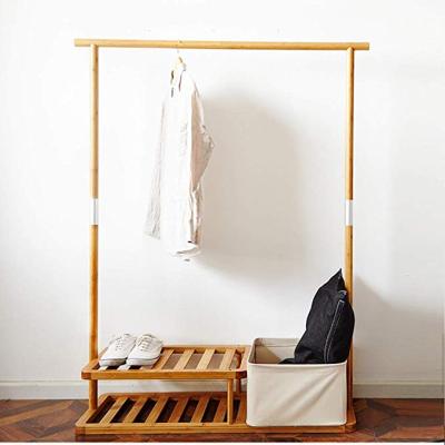 China Multifunctional Sustainable Bamboo Clothing Rack With 2 Layers Shoe Rack And Folding Storage Basket Bedroom Hanger for sale