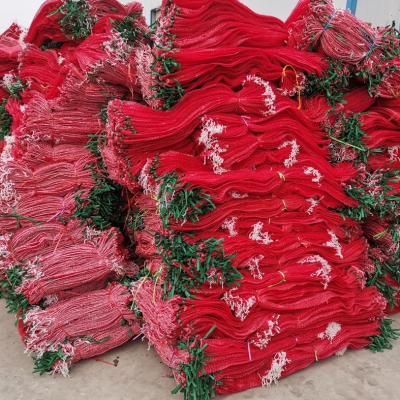 China Agriculture 25kg 30kg Tubular Drawstring PP Gauze Red Packaging Onion Vegetable Potato Mesh Bag for sale