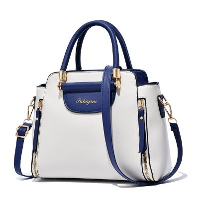 China 2021 fashion blue simple color bucket bag women's new luxury and white contrast ladies shoulder bag for sale