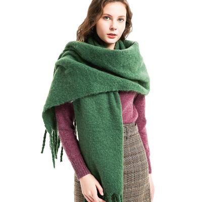 China Winter Fashion Solid Color Tassel Soft Smooth Comfortable Thick Shawl Women Warm Knitted Cover Up Scarf for sale