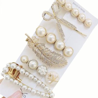 China 2021 Women's Luxury Soft Bling Diamond Feather Hairclips Set Girl's Pearl Hair Accessories for sale