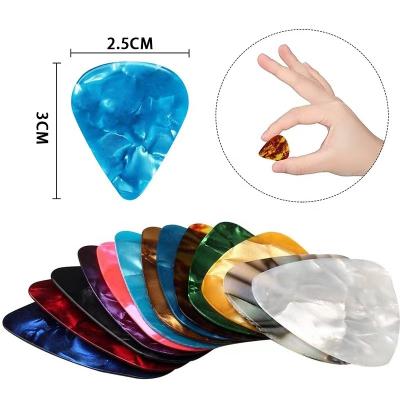 China Good Quality Celluloid Guitar Picks Custom Design Celluloid Guitar Plectrums Performance Stage 16 Tablets in 4 Size Box for sale