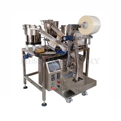 China Food Automatic Counting Chocolate Candy Milk Tablet Vibration Plate Packing Machine for sale