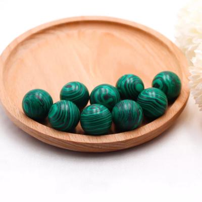 China Art Wholesale Top Natural folk 20mm Mini Carved Malachite Ball Quartz Reiki Crystal Sphere Balls For Healing for sale