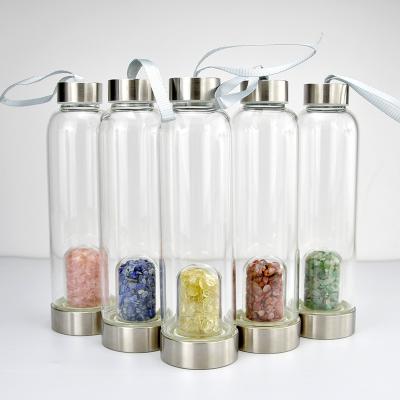 China Glass Water Bottle Rose Quartz Lapis Lazuli Gravel Crystal Charm Stone In Bottle Metal Sleeve 550ml Traditional Lid Water Bottle for sale