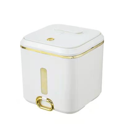 China New Design Light Sustainable Luxury Rice Storage Dispenser Container 15kg Kitchen Rice Storage Box Plastic Trash Can With Measuring Cup for sale