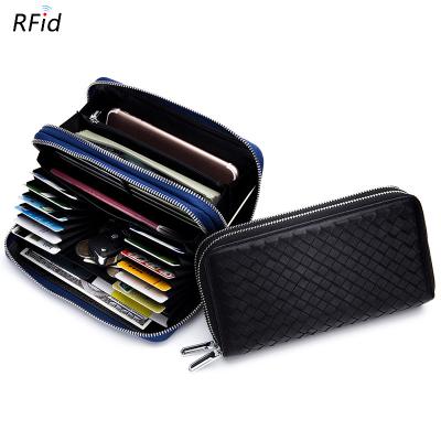 China Custom Made Unisex RFID Genuine Leather Wallet with Large Pocket Phone Clutch Double Zipper Travel Purse Wristband for Women Men for sale