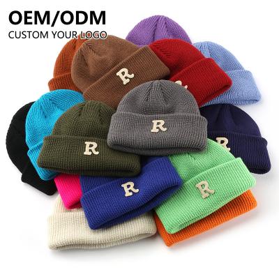 China Rib Woven Labels Unisex Designer Custom Logo JOINT Acrylic Outdoor Stocks Warm Knitted Winter Hats Beanies Hats for sale