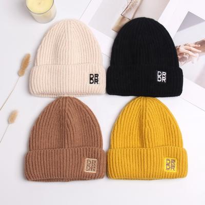 China New JOINT Trend Candy Colors Gorro Invierno Winter Knitted Hat Women Embroidery All-match Beanie Hats for sale