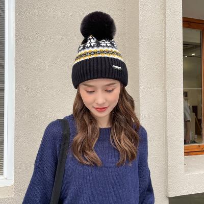 China Wholesale High Quality Christmas Knitted Hat Winter Beanie Pompom Caps For Women Warm Ski COMMON for sale