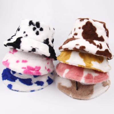 China Winter New Cow Print Decoration Warm Outdoor Velvet Plush Fur Bucket Hat For Women for sale