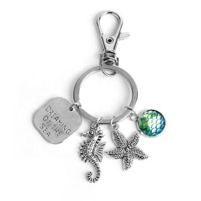 China Promotion/main key ring key chain holder souvenir shells/starfish high quality mermaid seahorse collection for sale