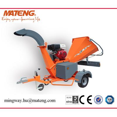 China Honda engine 13hp wood chipper, 360 degree rotating discharge chute with quick hitch draw bar for sale