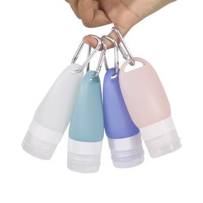 China FUNN122 4-in-1 Portable Lotion Silicone Squeeze Bottles Shampoo Silicon Travel Leak Resistant Package Chain Key Empty Bottles Set for sale