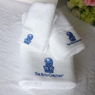 China 100% cotton custom embroidered logo white terry hotel bath towel set for sale