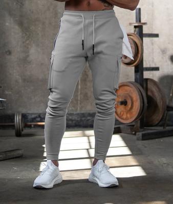 China Breathable Custom Stretched Workout Sweatpants Men's Trouser Pants Fitness Casual Multi Pockets Sport Functional Panties for sale