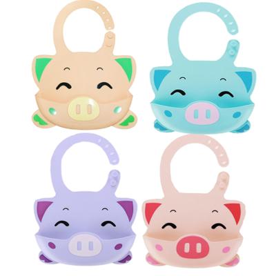 China New Silicone Pocket Antibacterial Baby Rice Bibs Waterproof Bibs With Pockets Kids Prints Animal Bibs for sale