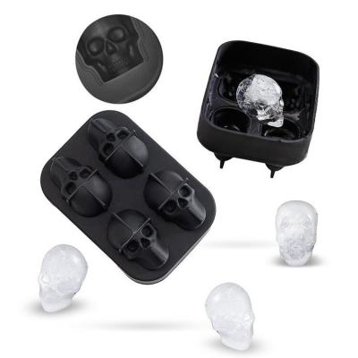 China Viable Wholesale Cheap Whiskey 4 Cavity Silicone Ice Ball Mold 3D Skull Ice Tray for sale