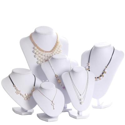 China Widely Used White Luxury Jewelry Store Display Set Or Home Dressing Table Special Design PU Necklace Jewelry Display Rack for sale