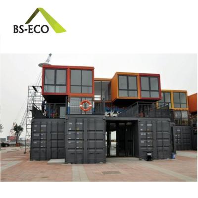 China Dormitories Steel Frame Building Prefab Home Expandable Shipping Container House for sale