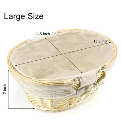 China Sustainable Wicker Easter Woven Fruit Basket Empty Oval Wicker Picnic Basket Storage Large With Double Handles for sale